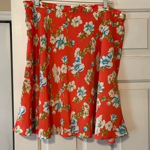 Jennifer Moore orange and flower skirt